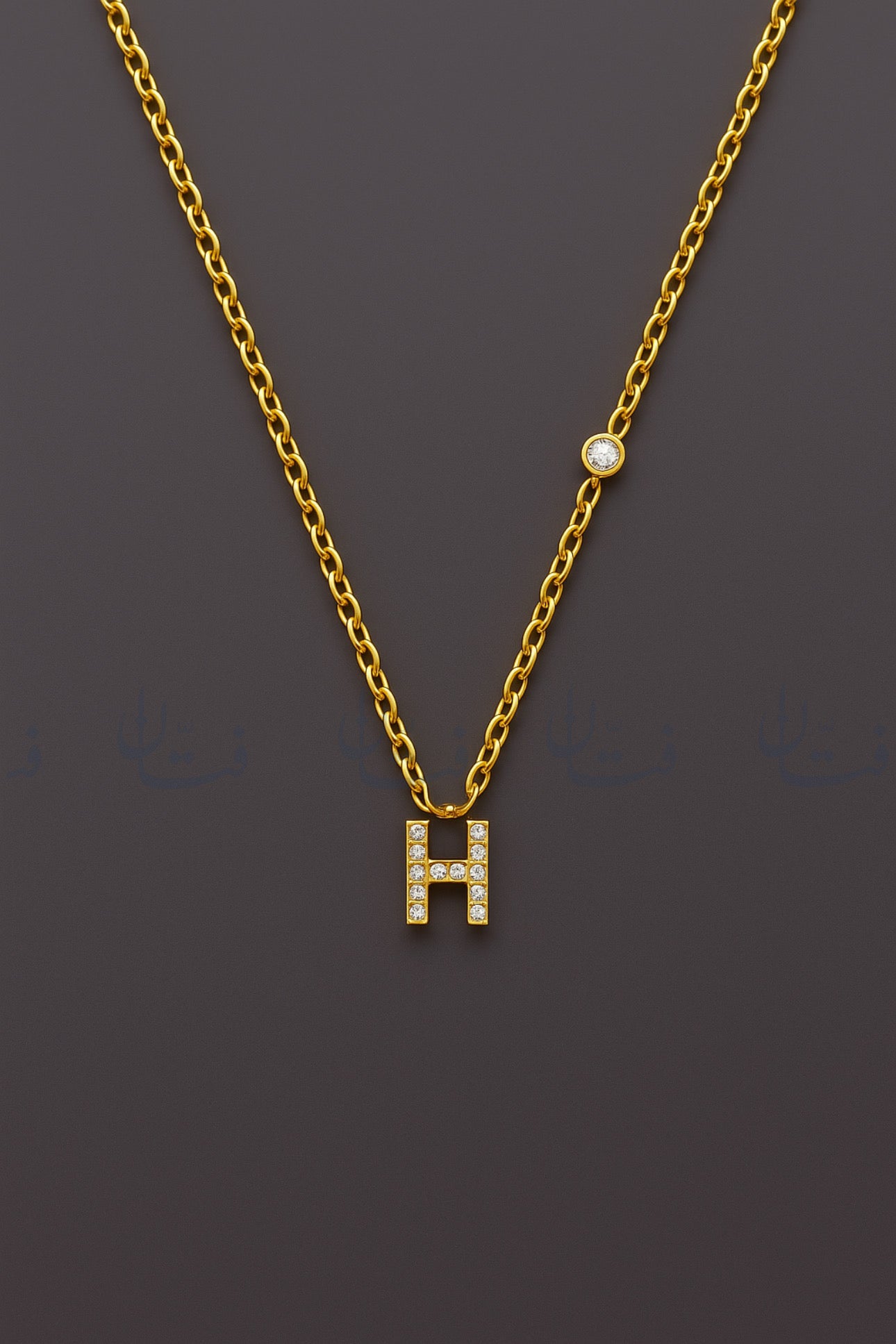 حرف H ذهبي