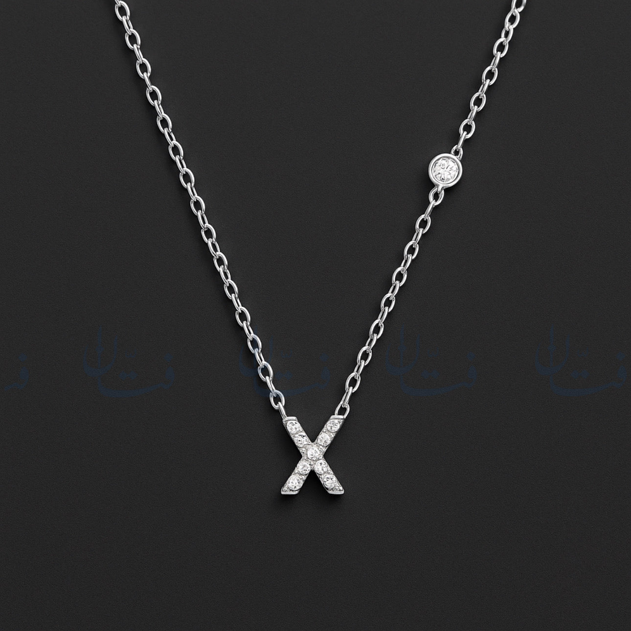 حرف X فضي