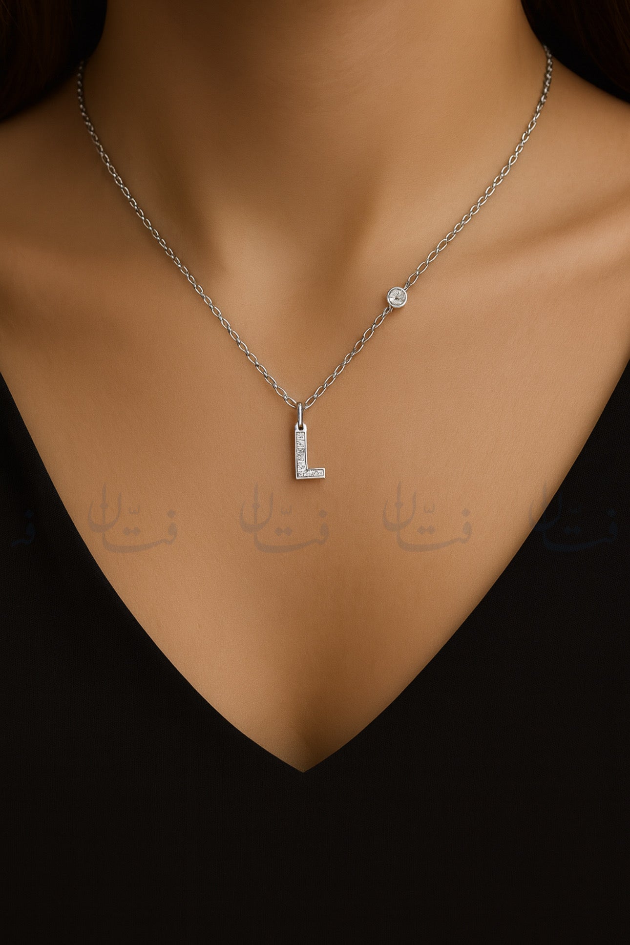 حرف L فضي