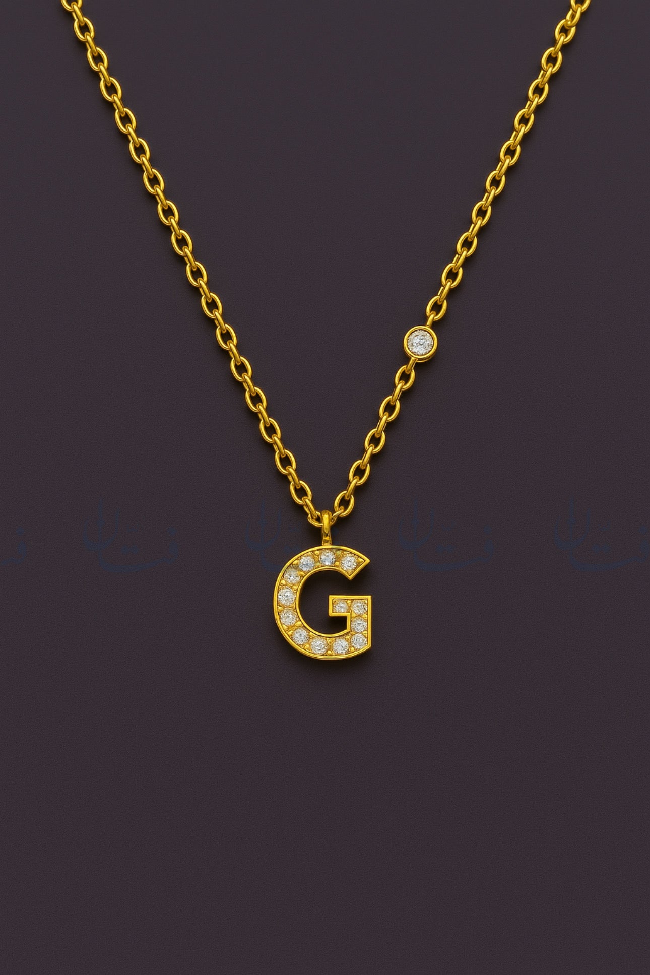 حرف G ذهبي