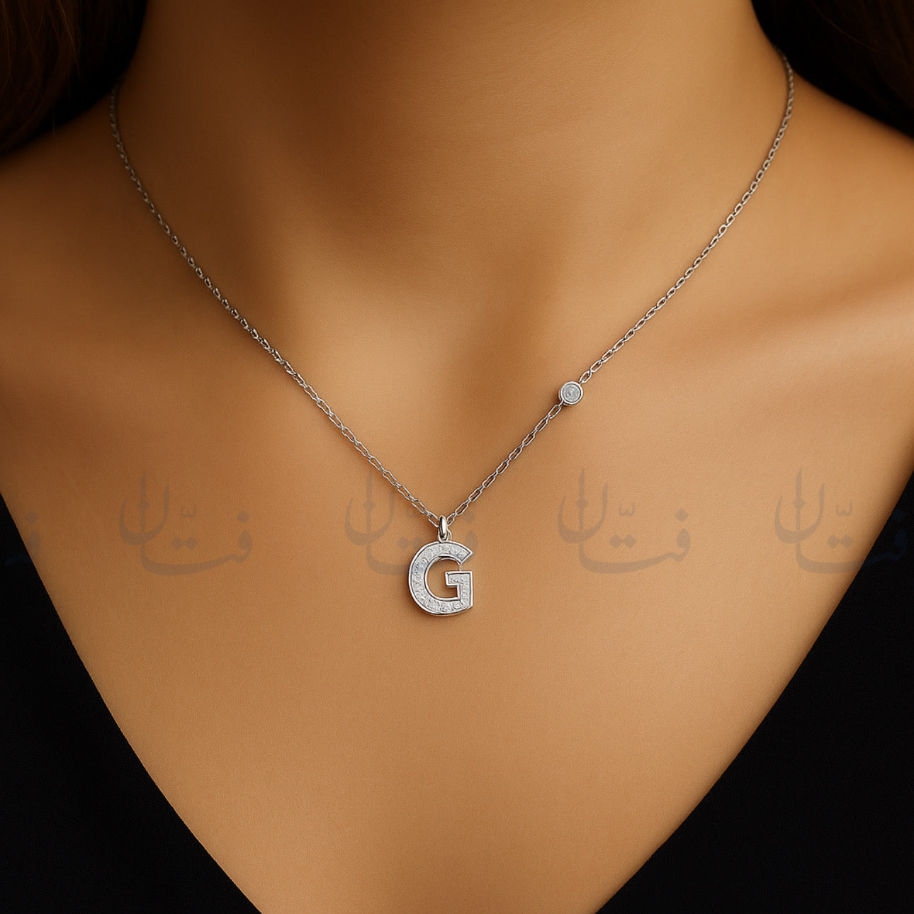 حرف G فضي